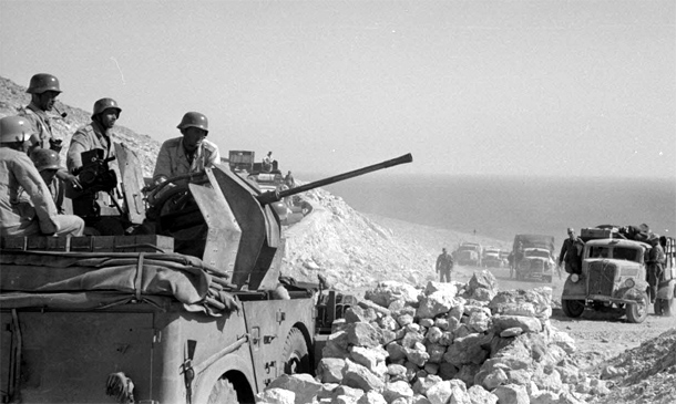 Improvised Flakwagen Horch escorting a supply column in North Africa